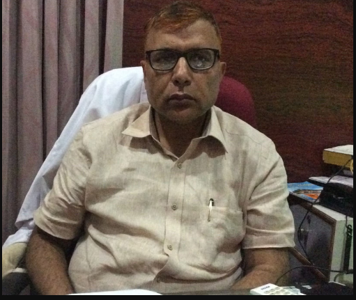 Dr. Satish Midha